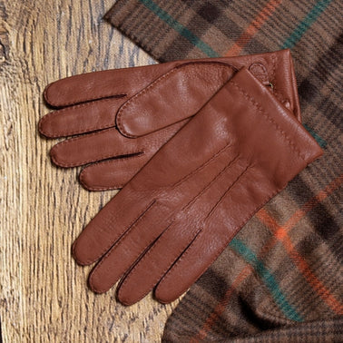 Dents men's brown leather gloves flat lay