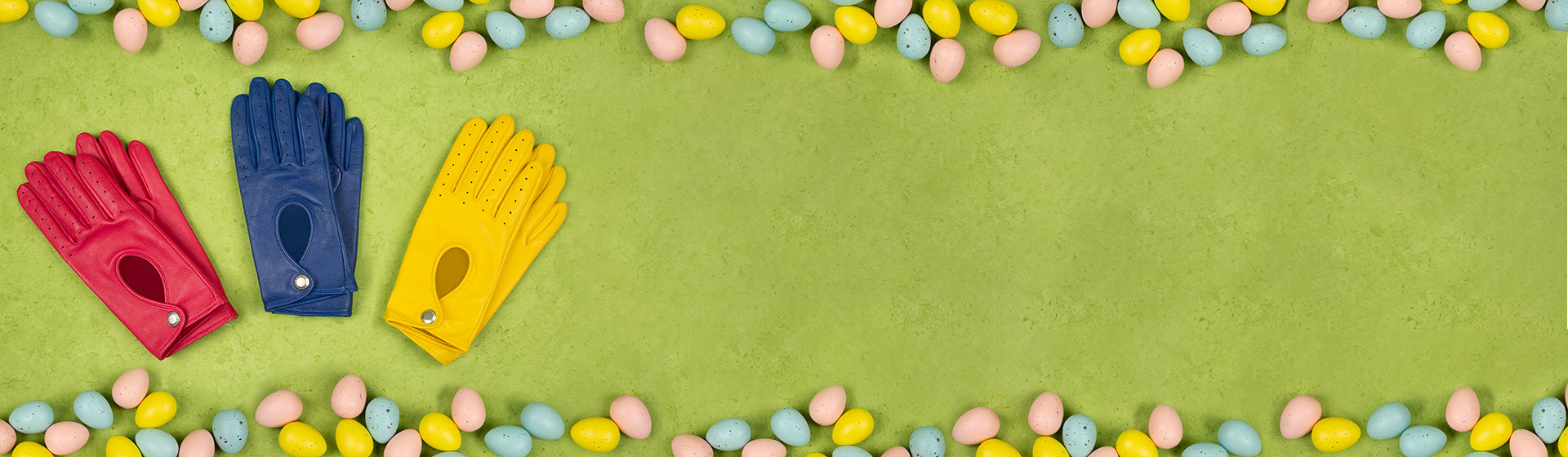 Easter themed image with womens leather driving gloves laid out in three different colours