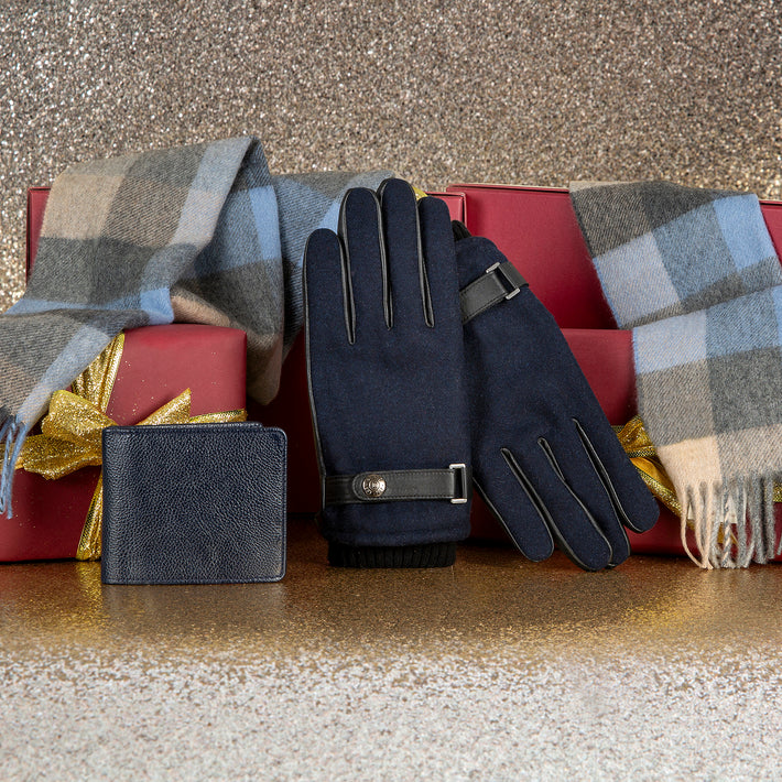 Men's blue leather gloves, wallet and checked cashmere scarf with Christmas presents