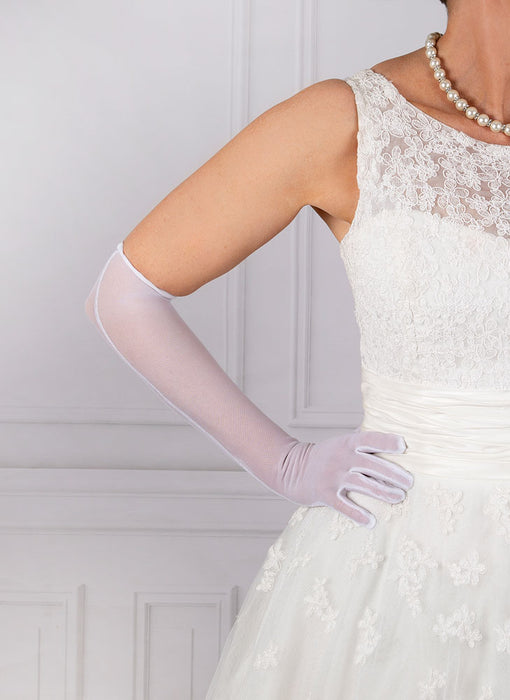 Woman wearing ladies long white tulle gloves